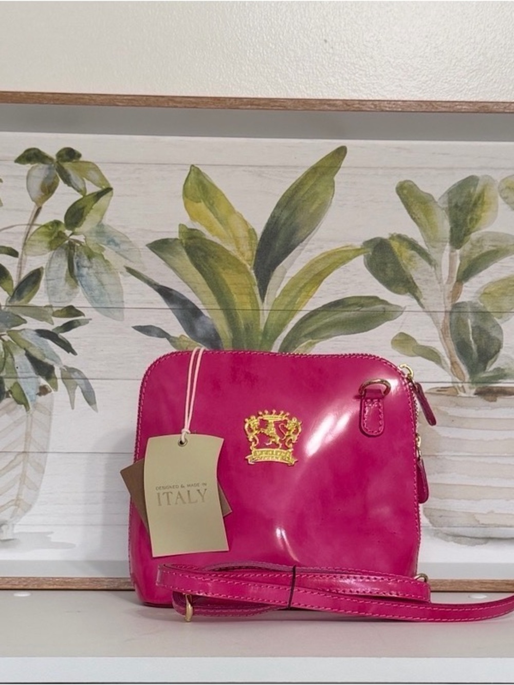 Hot Pink Leather Crossbody Bag with Gold Crest Accent